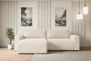 A modern living room with a beige sectional sofa, decorative wall panels, and artwork.