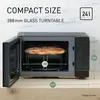 A microwave oven with its door open, showing a pizza inside and dimensions indicated by text and lines. Anteprima dell’immagine prodotto