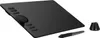A black graphic tablet with a stylus and a stand on a white background. Náhled obrázku produktu