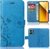 A collage of images showing a blue flip phone case with a floral and butterfly design. Produktbild-Vorschau