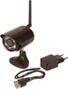 A black security camera with an antenna, a USB cable, and a power adapter are displayed against a white background. Produktbild-Vorschau