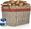 A close-up shot of a wicker basket filled with firewood, placed on a white background. Produktbild-Vorschau