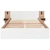A white and wood-colored bed frame with integrated nightstands, shown from the front without a mattress. Produktbild-Vorschau