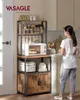 A woman is standing in a kitchen next to a rustic-style kitchen shelf unit. Náhled obrázku produktu