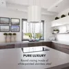 A modern kitchen with a white island range hood and sleek cabinetry. Náhľad obrázku produktu