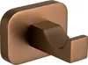 A close-up studio shot of a single copper-colored bathroom hook against a white background. Anteprima dell’immagine prodotto