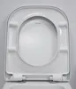 A close-up, overhead view of a white toilet seat. Produktbild-Vorschau