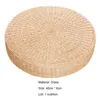 A round woven cushion on a white background with product details below. Produktbild-Vorschau