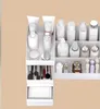 A white cosmetic organizer filled with various beauty products and makeup brushes, set against a light beige background. Náhľad obrázku produktu