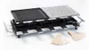 A raclette grill with a griddle and a stone plate, along with several small pans and some paper accessories, is displayed on a white background. Produktbild-Vorschau
