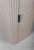 A close-up view of a beige cabinet with vertical slats and a dark handle. Voir les images du produit