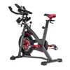 A stationary exercise bike against a white background. Voir les images du produit
