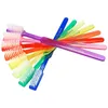 A collection of multi-colored toothbrushes fanned out. Produktbild-Vorschau