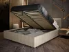 A modern bedroom with a bed that has its storage compartment open, revealing stored items. Produktbild-Vorschau