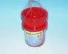 A red bucket and spade set is packaged in a net bag against a light blue background. Anteprima dell’immagine prodotto