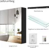 A bathroom mirror cabinet with its accessories laid out. Produktbild-Vorschau