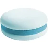 A single, light blue and white macaron on a white background. Náhled obrázku produktu