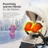 A child walking in the snow next to a stroller with hand warmers attached to the handle. Anteprima dell’immagine prodotto