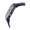 Side view of a blue and silver watch. Voir les images du produit