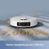 A white robot vacuum cleaner is shown on a grey carpet, with sand-like particles being vacuumed up, forming the number '7000 Pa' on the carpet. The text 'Starke Saugleistung von 7.000 Pa' is visible at the bottom. Produktbild-Vorschau