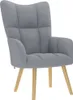 A light gray fabric armchair with wooden legs, shown against a white background. Náhľad obrázku produktu