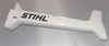 A white plastic part with the Stihl logo on it, lying on a light gray surface. Produktbild-Vorschau
