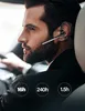 A man wearing a Bluetooth headset while driving a car. Produktbild-Vorschau