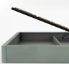 A close-up view of an open bed frame with storage. Produktbild-Vorschau