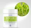 A product shot of a cream jar with a circular inset image of microgreens. Produktbild-Vorschau