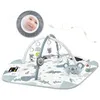 A baby play mat with arches and hanging toys, featuring a koala design and a mirror showing a baby's face. Voir les images du produit