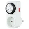 A white mechanical timer with a black dial and a red button, plugged into a white socket. Produktbild-Vorschau