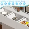 A close-up view of a white kitchen cabinet with drawers open, showcasing storage solutions and some items inside. Produktbild-Vorschau