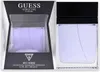A box and bottle of Guess Seductive Homme Eau de Toilette. Voir les images du produit