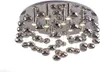 A close-up, studio shot of a modern chrome chandelier with multiple bubble-like glass orbs. Podgląd zdjęcia produktu