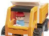 A close-up shot of a wooden toy dump truck with a small wooden figure driver inside. Produktbild-Vorschau