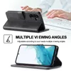 A person's hands are shown typing on a keyboard, with a black phone case displayed in the foreground, propped up to show its stand feature. Below this, another image shows a smartphone inside the case, also propped up. Produktbild-Vorschau