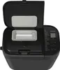 A black Panasonic bread maker with its lid open, revealing the interior bread pan and a compartment for ingredients. Podgląd zdjęcia produktu