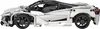 Side view of a white and black Lego-style sports car model. Produktbild-Vorschau