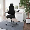 An office chair and desk setup in a well-lit room. Produktbild-Vorschau