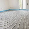 A room under construction with underfloor heating pipes laid out on the floor. Náhľad obrázku produktu