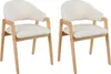 Two cream-colored chairs with light brown wooden frames are shown against a white background. Podgląd zdjęcia produktu