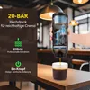 A hand holding a portable espresso machine over a glass of coffee. Produktbild-Vorschau