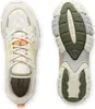 A top-down view of a pair of Lacoste sneakers, showing the top of one shoe and the sole of the other. Produktbild-Vorschau