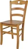A wooden chair with a heart-shaped cutout in the backrest. Produktbild-Vorschau