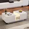 A modern white coffee table with LED lighting, placed in a living room setting. Produktbild-Vorschau