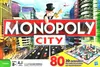 The image is a marketing image for the board game Monopoly City, showing the game box art with illustrations of a city, the Monopoly man, and a game board. Produktbild-Vorschau