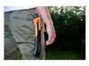 A person's hip and hand are shown, with a tool clipped to their pants. Náhled obrázku produktu