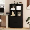 A black bookshelf with books and decorative items is placed next to a white desk with a computer monitor. Podgląd zdjęcia produktu