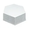 A stack of hexagonal mirror tiles on a white background. Produktbild-Vorschau