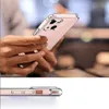 A person is holding a pink iPhone in a clear protective case. Produktbild-Vorschau